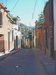 A typical narrow colonial street in San Miguel de Allende