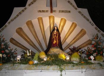 A public fountain decorated for Friday de Sorrows, Holy Week, Mexico