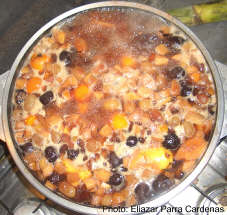 Mexican ponche simmering on the stove